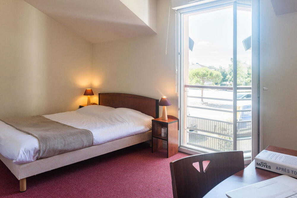 Foto de una habitación de Zenitude Hôtel-Résidences Nantes - La Beaujoire