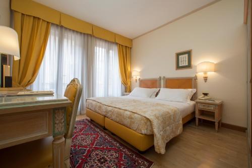 Foto de una habitación de Hotel Majestic Toscanelli (centro storico)