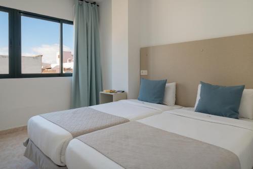 Foto de una habitación de Apartamentos Arrecifeando