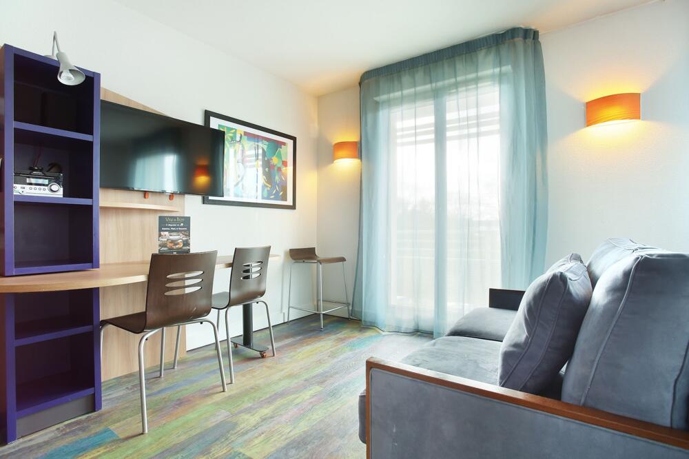 Foto de una habitación de Hotel Suite-Home Orléans-Saran