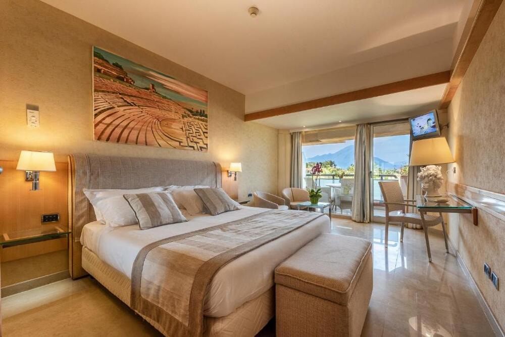 Foto de una habitación de Hotel Acacia Resort Parco Dei Leoni