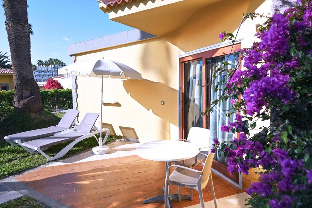 Foto de una habitación de HL Miraflor Suites Hotel