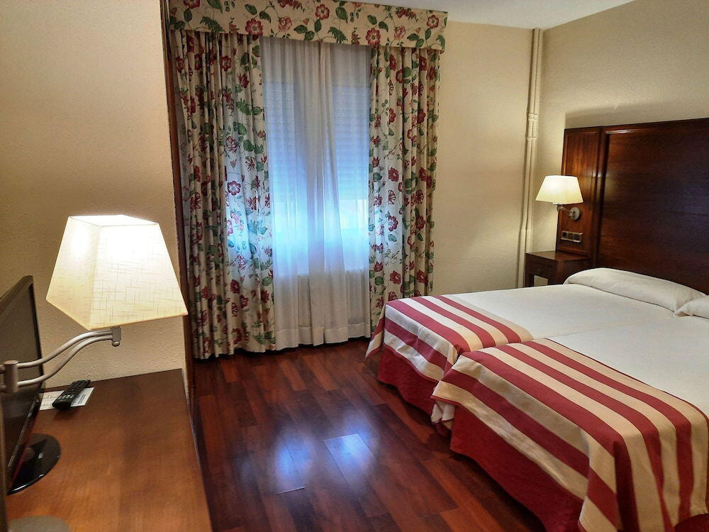 Foto de una habitación de Hotel Urogallo