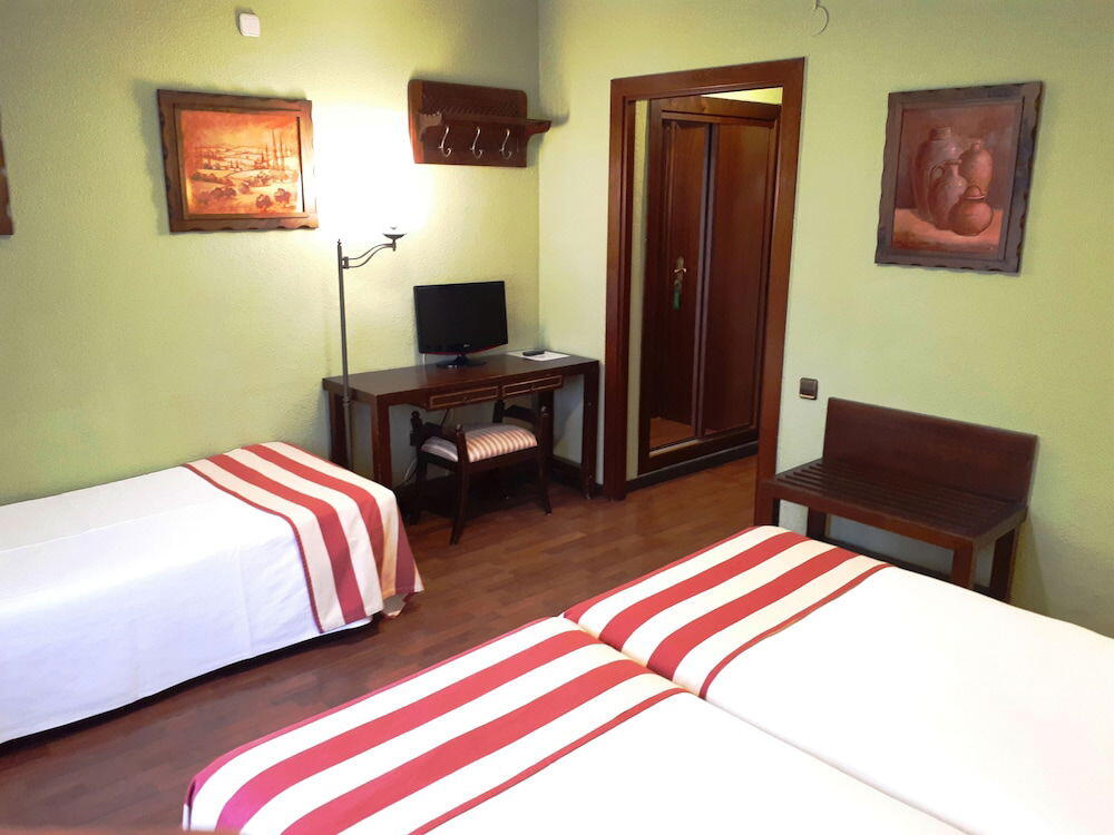 Foto de una habitación de Hotel Urogallo