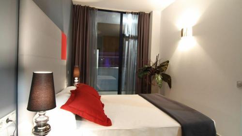 Foto de una habitación de Apartamentos Apolo Suites Rentalmar