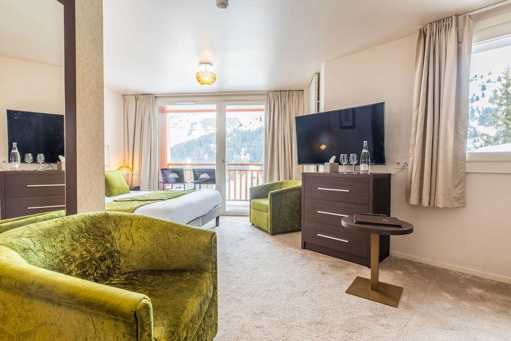 Foto de una habitación de Madame Vacances Hôtel &amp;amp; Spa Le Mottaret