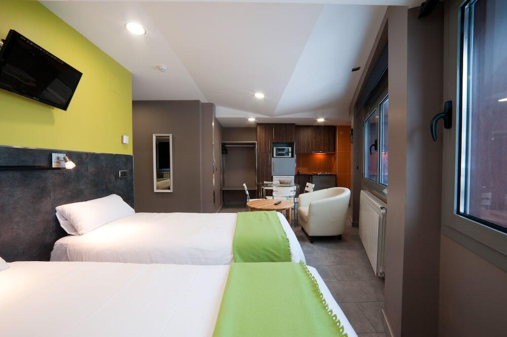 Foto de una habitación de Aparthotel Les Olimpiades