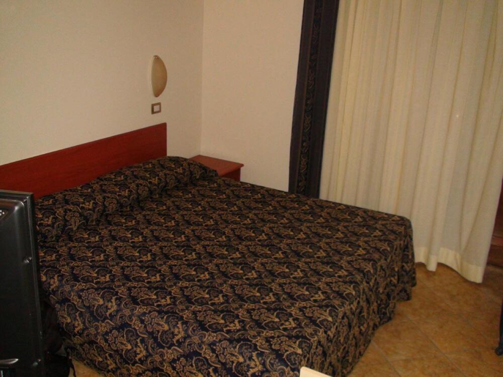 Foto de una habitación de Al Palazzo dei Priori Hotel