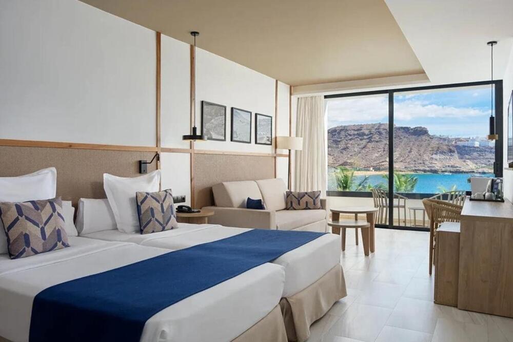 Foto de una habitación de Hotel H10 Costa Mogán