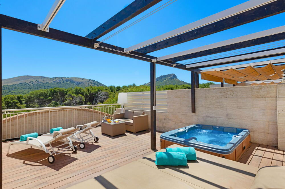 Foto de una habitación de Hotel VIVA Cala Mesquida Suites &amp;amp; Spa Adults Only 16
