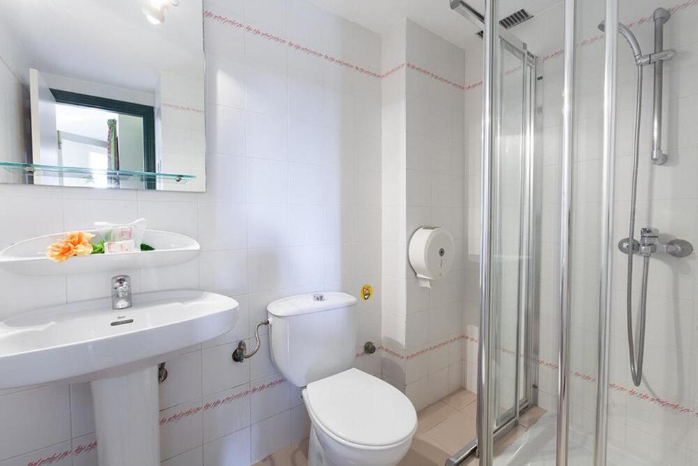 Foto del baño de Hotel Puerto Caleta
