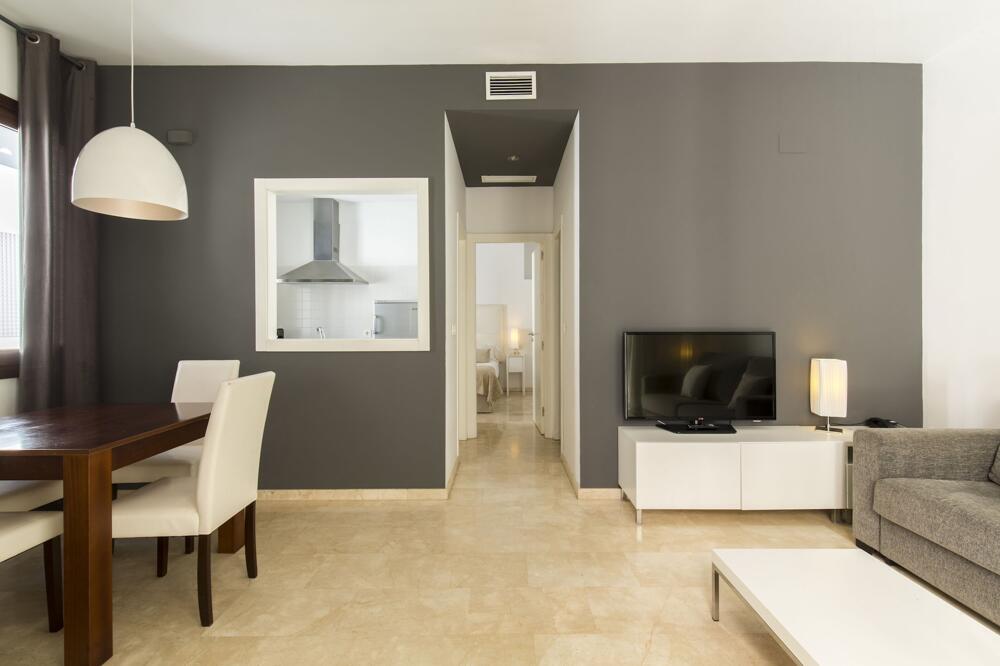 Foto de una habitación de Aparthotel tuGuest Elvira Suites