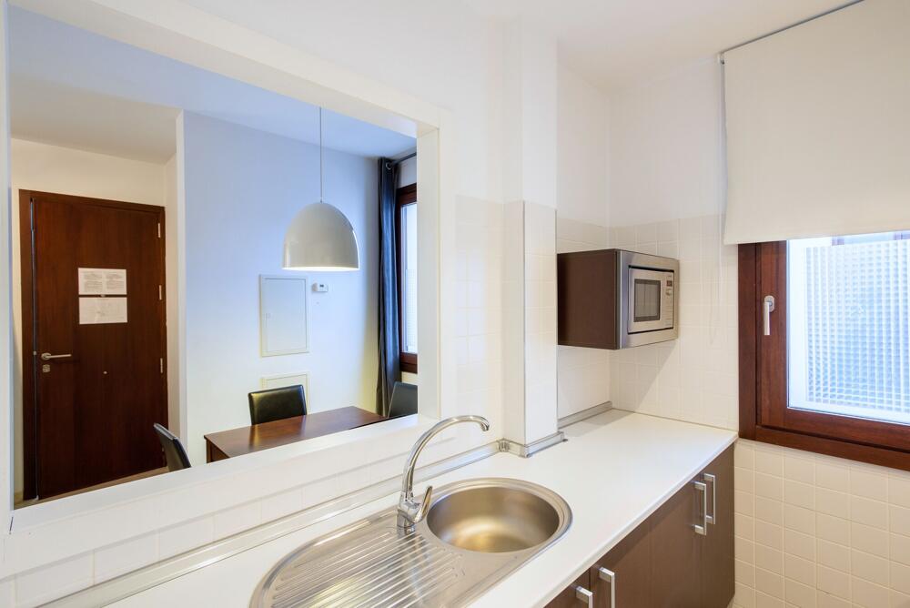 Foto de una habitación de Aparthotel tuGuest Elvira Suites