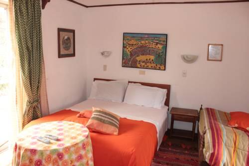 Foto de una habitación de Hotel Hosteria Iloca