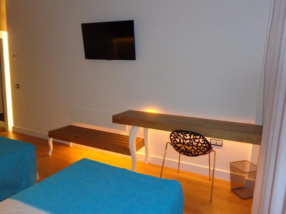 Foto de una habitación de Hotel Brisamar Suites