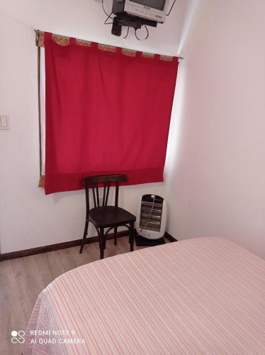 Foto de una habitación de Calafate Viejo Hostel