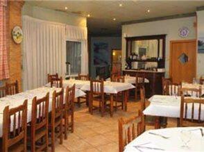 Foto de restauración de Aparthotel Tres Caminos