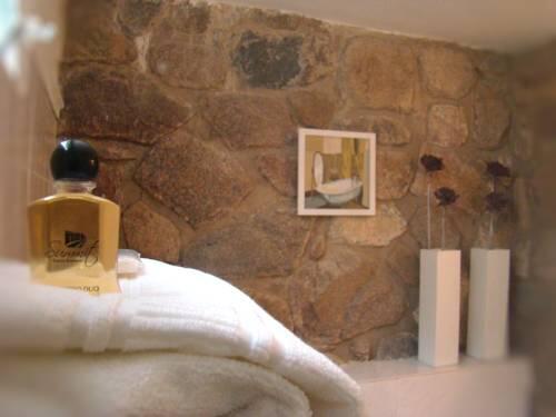 Foto del baño de Posada Summit Suites