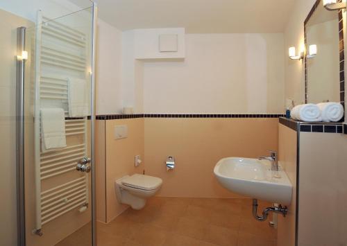 Foto de una habitación de Strandhafer Aparthotel