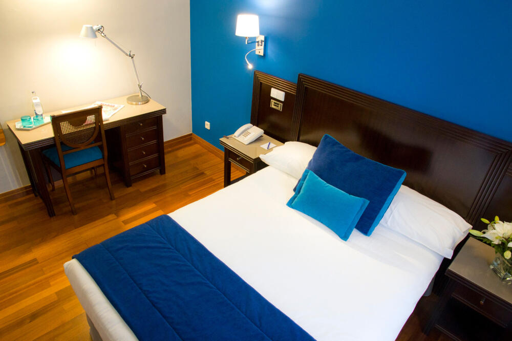 Foto de una habitación de Hotel Escuela Santa Brígida