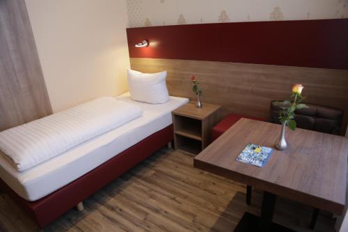 Foto de una habitación de Alexander Business Hotel Hannover City