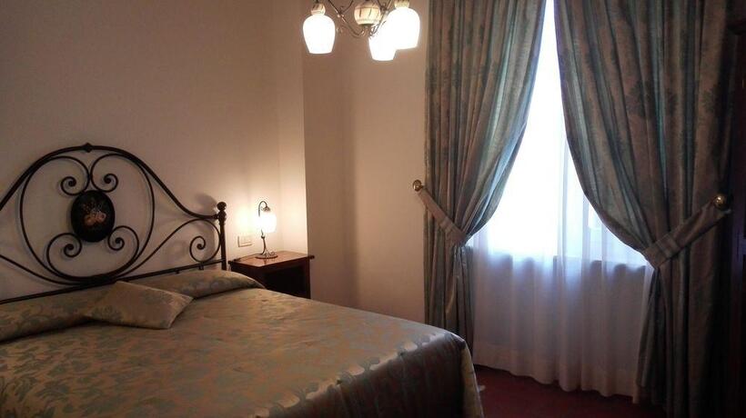 Foto de una habitación de Aparthotel Palazzo La Fenice