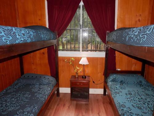 Foto de una habitación de Cabañas Los Timbó
