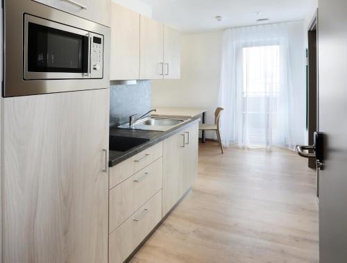 Foto de una habitación de Apartment Hotel 37