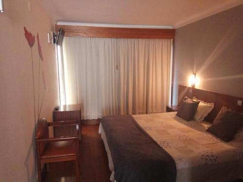 Foto de una habitación de Hotel Sao Cristovao
