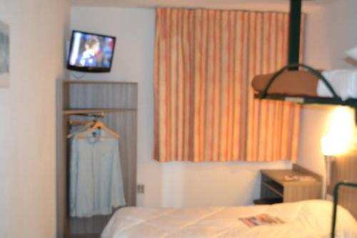 Foto de una habitación de Hotel Initial by Balladins Béthune