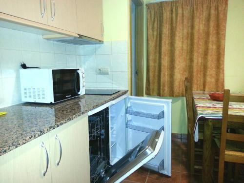 Foto de una habitación de Aparthotel Llempó