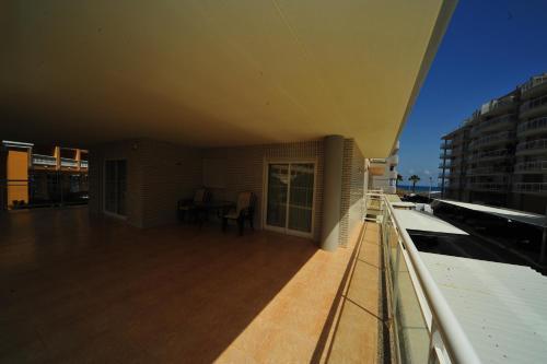 Foto de una habitación de Alquileres Vacacionales La Volta III Orange Costa