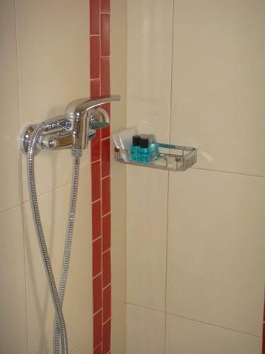 Foto del baño de Apartamentos Lisbon Inn 
