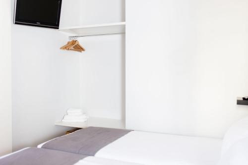 Foto de una habitación de Apartamentos Valenciaflats Torres de Serrano