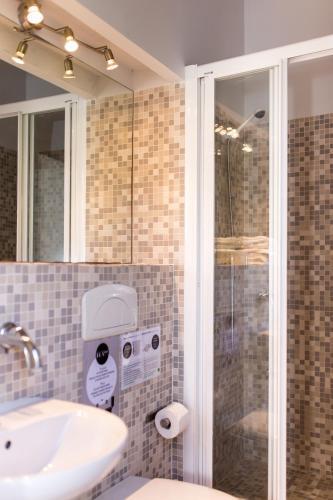 Foto del baño de Apartamentos Valenciaflats Torres de Serrano