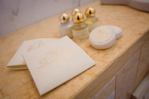 Foto del baño de Aparthotel Palazzo La Fenice