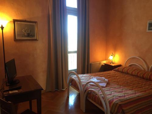 Foto de una habitación de Albergo dell&amp;#039;Academia