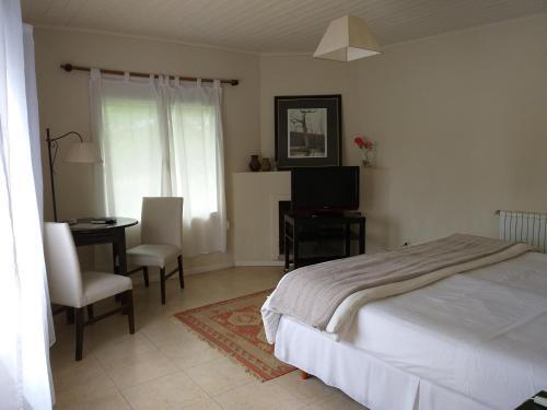 Foto de una habitación de Hotel Boutique Posada Piedras Blancas