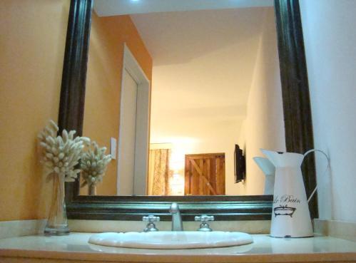 Foto del baño de Posada Summit Suites