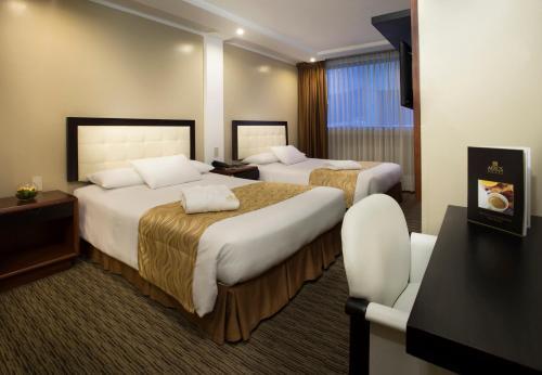 Foto de una habitación de Hotel Akros