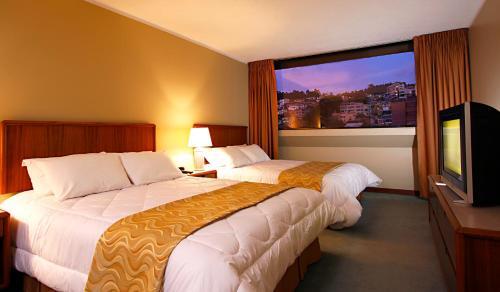 Foto de una habitación de Hotel Akros
