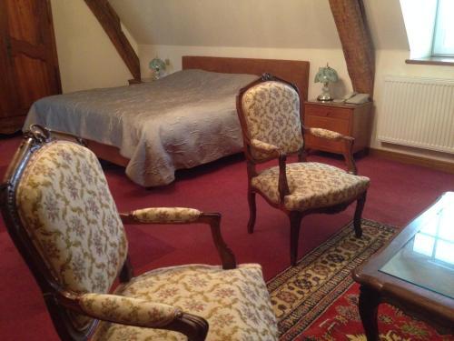 Foto de una habitación de Hotel Château de la Berchère