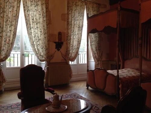 Foto de una habitación de Hotel Château de la Berchère