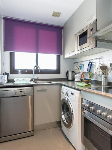 Foto de una habitación de Apartamentos City Beach Lluch