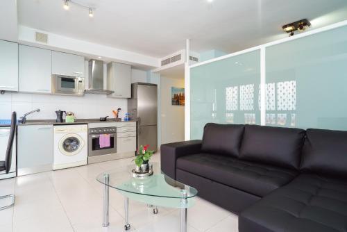 Foto de una habitación de Apartamentos City Beach Lluch
