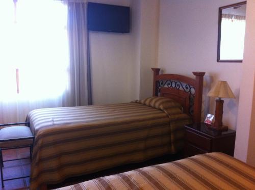 Foto de una habitación de Hotel Oro Viejo