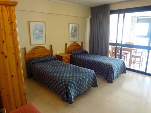 Foto de una habitación de Alquileres Vacacionales Santa Margarita - Fincas Benidorm