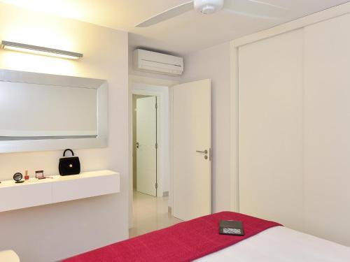 Foto de una habitación de San Agustin Beach Apartments
