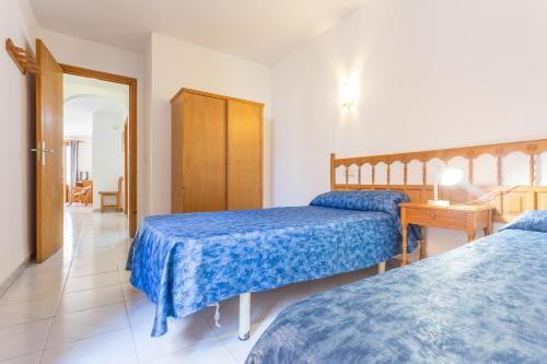 Foto de una habitación de Apartamentos Viviendas Margarita II