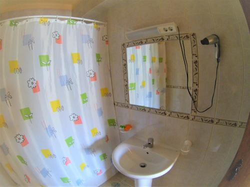 Foto del baño de Apartamentos Turisticos Praia Grande